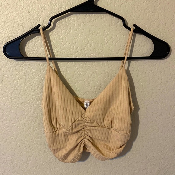 Like new sinched from sides and front super-cropped beige tank top. - Picture 1 of 7